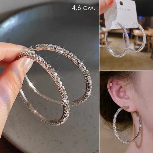 Серьги кольца с сияющими кристаллами 1 пара. Цвет: СЕРЕБРО