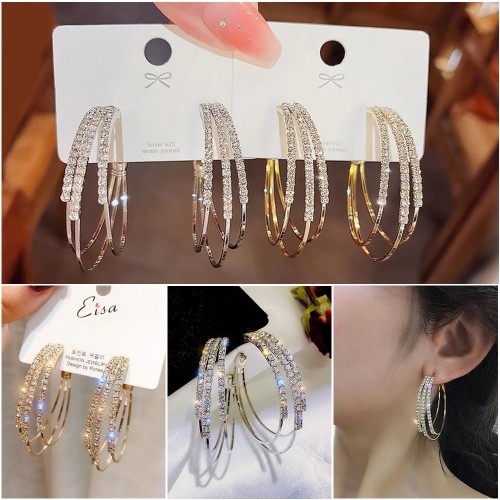 Серьги три кольца с сияющими кристаллами